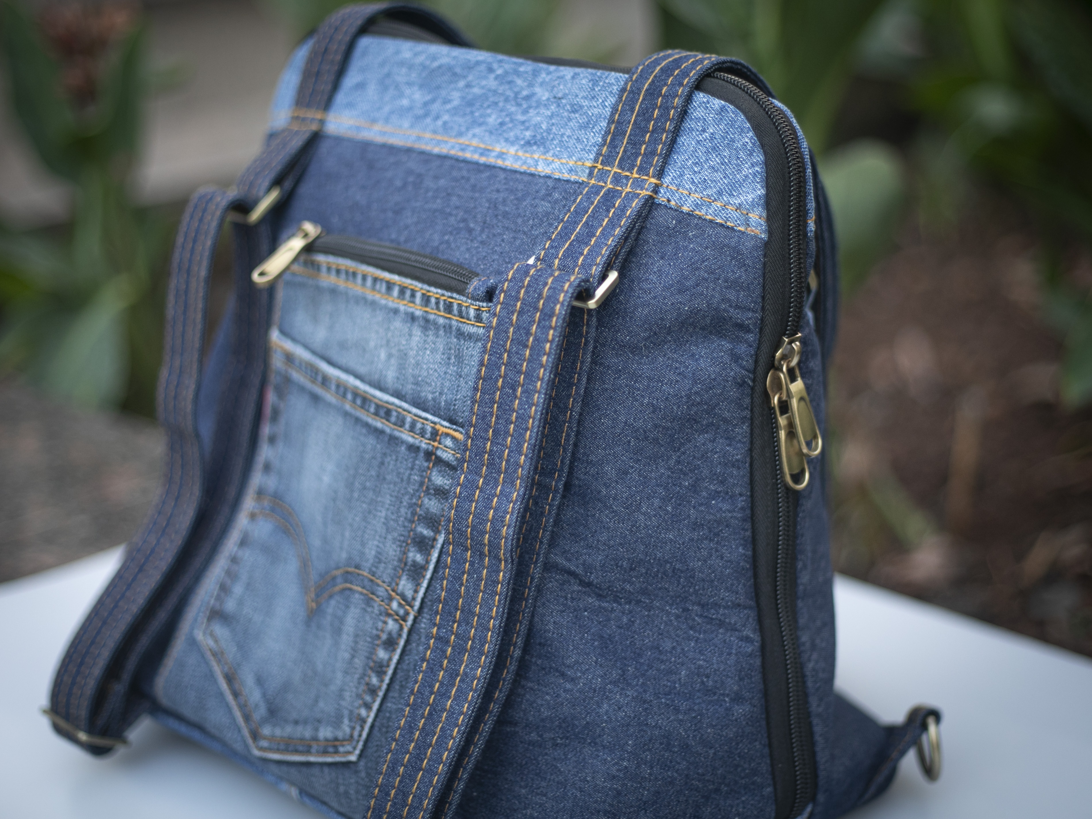 Structured side profile of the Born Again denim bag