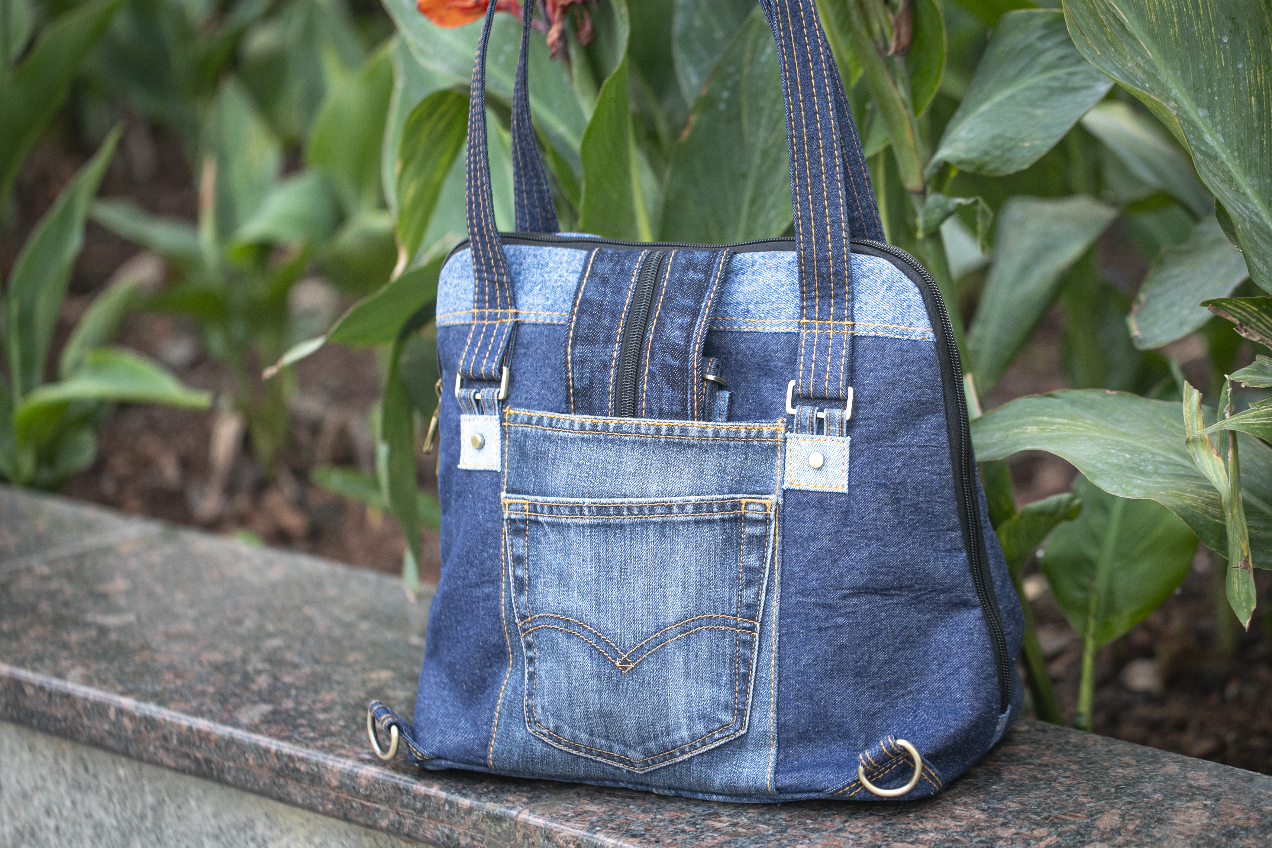 Born Again upcycled denim tote showing its unique pocket composition