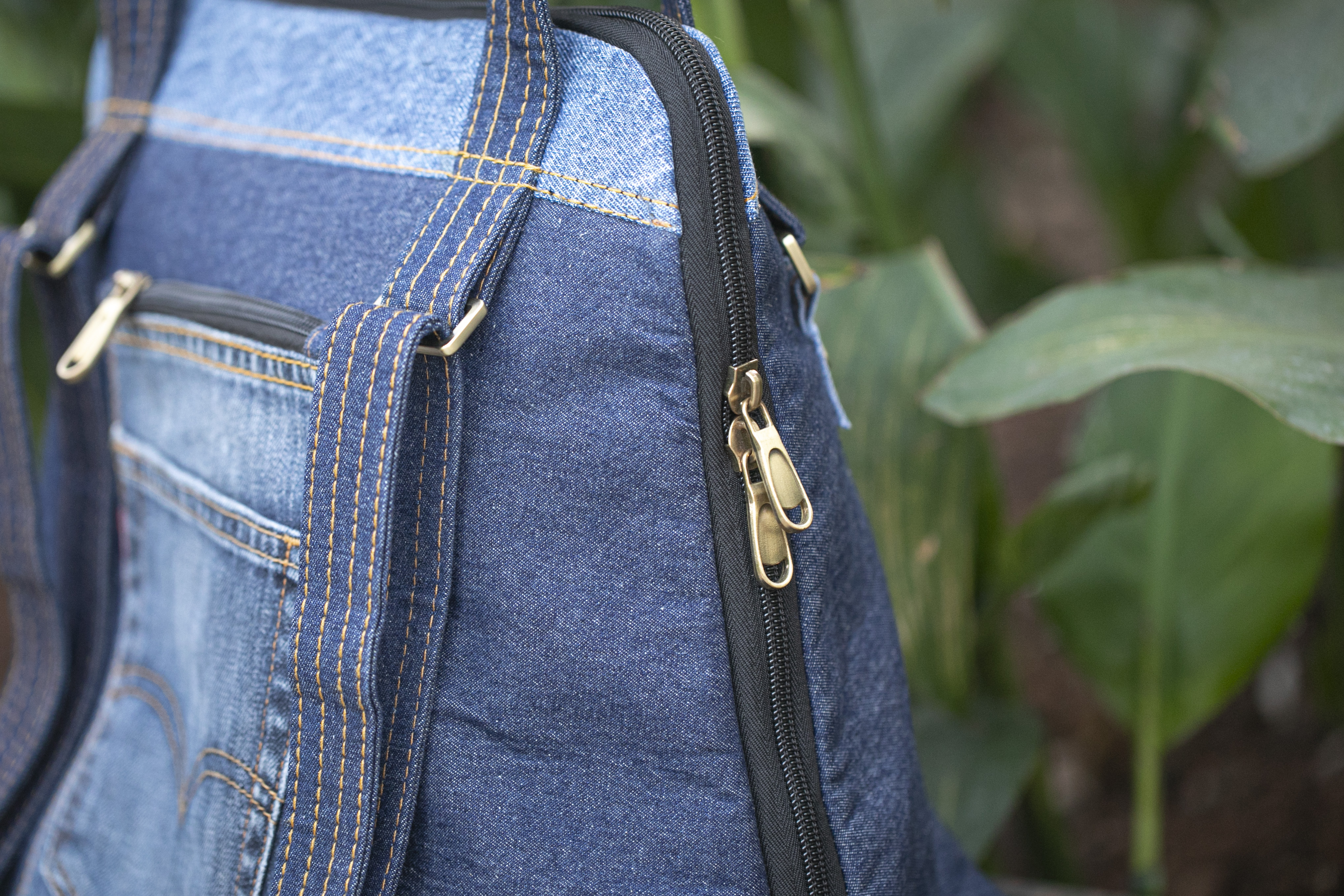 Close-up of Born Again stitching and metal clips